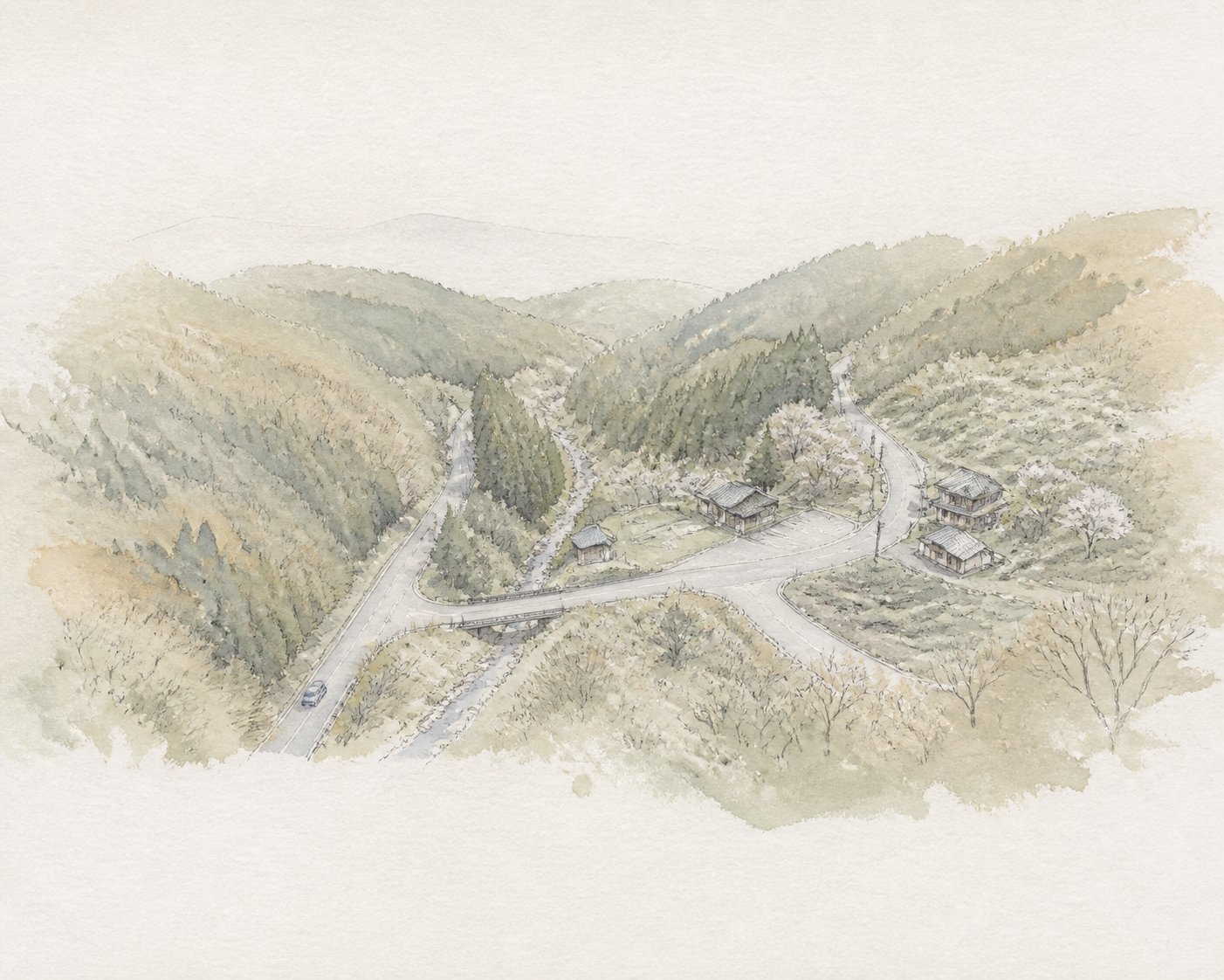 山あいを縫って合流する二本の道路の俯瞰